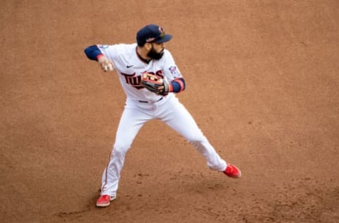 Sep 29, 2020; Minneapolis, Minnesota, USA; Minnesota Twins third baseman Marwin Gonzalez (9) throws the ball to first base in the seventh inning against the Houston Astros at Target Field. Mandatory Credit: Jesse Johnson-USA TODAY Sports