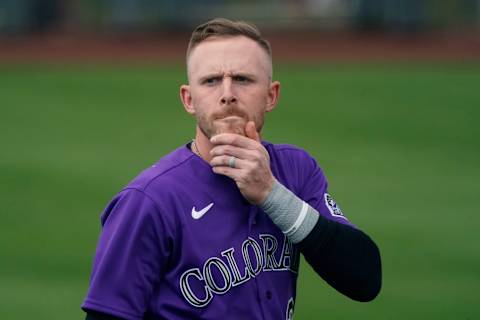 Mar 12, 2021; Scottsdale, Arizona, USA; Colorado Rockies shortstop Trevor Story (27) reacts to fans during a spring training game against the San Francisco Giants at Scottsdale Stadium. Mandatory Credit: Rick Scuteri-USA TODAY Sports