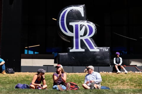 Apr 1, 2021; Denver, Colorado, USA; Fans relax in the grass at McGregor Square before the Opening Day game between the Colorado Rockies and the Los Angeles Dodgers at Coors Field. Mandatory Credit: Isaiah J. Downing-USA TODAY Sports