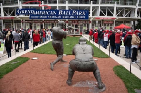 Reds fans wait in line outside Great American Ballpark just before the Opening Day game starts, Thursday, April 1, 2021 in Cincinnati, Ohio.Reds Opening Day In Downtown Cincinnati