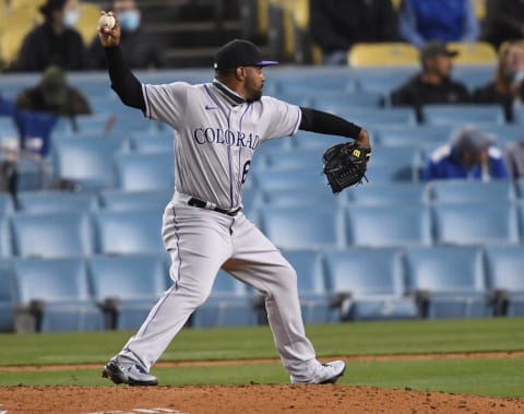 Apr 14, 2021; Los Angeles, California, USA; Colorado Rockies relief pitcher Mychal Givens (60) in the seventh inning of the game against the Los Angeles Dodgers at Dodger Stadium. Mandatory Credit: Jayne Kamin-Oncea-USA TODAY Sports