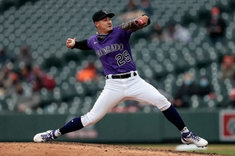 Apr 21, 2021; Denver, Colorado, USA; Colorado Rockies relief pitcher Robert Stephenson (29) pitches in the seventh inning against the Houston Astros at Coors Field. Mandatory Credit: Isaiah J. Downing-USA TODAY Sports