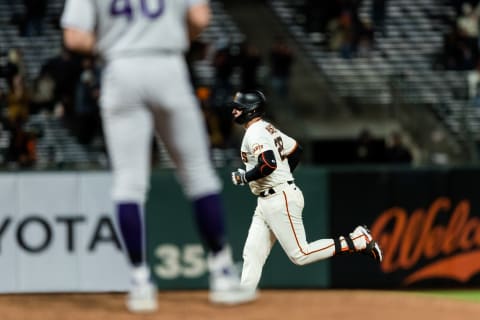 San Francisco Giants catcher Buster Posey (28) runs the bases after hitting a solo home run against the Colorado Rockies in the sixth inning at Oracle Park. Mandatory Credit: John Hefti-USA TODAY Sports