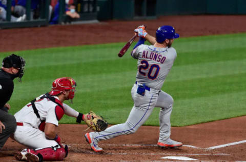 May 3, 2021; St. Louis, Missouri, USA; New York Mets first baseman Pete Alonso (20) hits a double during the third inning against the St. Louis Cardinals at Busch Stadium. Mandatory Credit: Jeff Curry-USA TODAY Sports