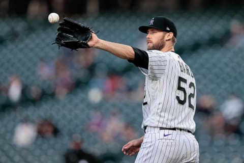 May 12, 2021; Denver, Colorado, USA; Colorado Rockies relief pitcher Daniel Bard (52) in the seventh inning against the San Diego Padres in the seventh inning against the San Diego Padres at Coors Field. Mandatory Credit: Isaiah J. Downing-USA TODAY Sports