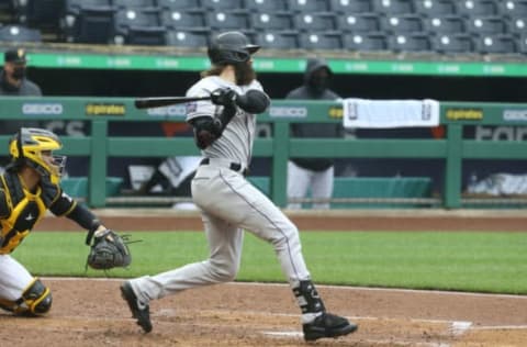 May 29, 2021; Pittsburgh, Pennsylvania, USA; Colorado Rockies right fielder Charlie Blackmon (19) singles against the Pittsburgh Pirates during the fourth inning at PNC Park. Mandatory Credit: Charles LeClaire-USA TODAY Sports