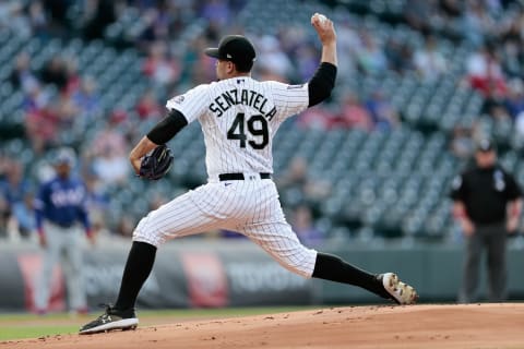 Jun 2, 2021; Denver, Colorado, USA; Colorado Rockies starting pitcher Antonio Senzatela (49) pitches in the first inning against the Texas Rangers at Coors Field. Mandatory Credit: Isaiah J. Downing-USA TODAY Sports