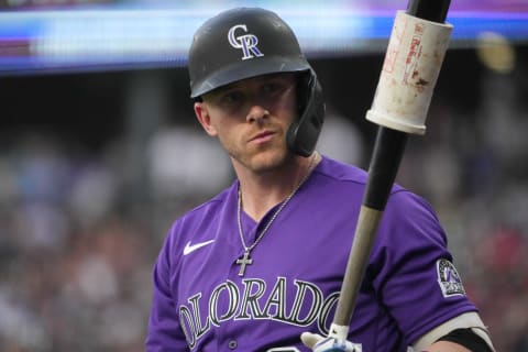 Jun 19, 2021; Denver, Colorado, USA; Colorado Rockies shortstop Trevor Story (27) waits on deck to bat against the Milwaukee Brewers in the first inning at Coors Field. Mandatory Credit: Ron Chenoy-USA TODAY Sports