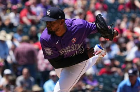 Jul 4, 2021; Denver, Colorado, USA; Colorado Rockies starting pitcher German Marquez (48) delivers a pitch in the first inning against the St. Louis Cardinals at Coors Field. Mandatory Credit: Ron Chenoy-USA TODAY Sports