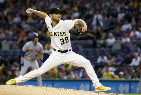 Jul 16, 2021; Pittsburgh, Pennsylvania, USA; Pittsburgh Pirates starting pitcher Chad Kuhl (39) pitches against the New York Mets during the second inning at PNC Park. Mandatory Credit: Charles LeClaire-USA TODAY Sports