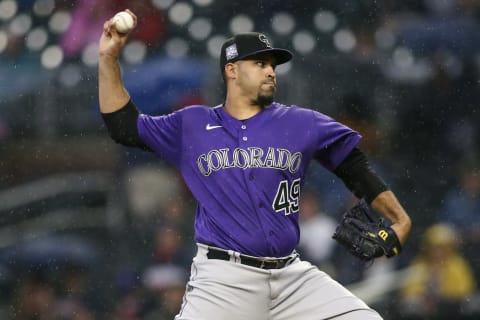 Sep 15, 2021; Atlanta, Georgia, USA; Colorado Rockies starting pitcher Antonio Senzatela (49) throws against the Atlanta Braves in the first inning at Truist Park. Mandatory Credit: Brett Davis-USA TODAY Sports