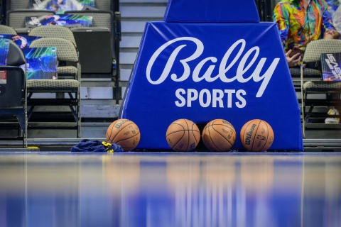 Jan 3, 2022; Dallas, Texas, USA; A view of the BallyÕs Sports logo and basketball bastion and Wilson game balls before the game between the Dallas Mavericks and the Denver Nuggets at the American Airlines Center. Mandatory Credit: Jerome Miron-USA TODAY Sports