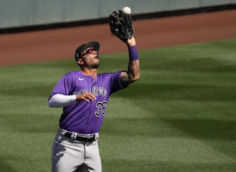 Mar 18, 2022; Scottsdale, AZ, USA; Colorado Rockies left fielder Tim Lopes catches an RBI-sacrifice fly ball from Arizona Diamondbacks Juancarlos Cintron in the third inning during a spring training game at Salt River Fields.Mlb Diamondbacks Spring Training Game