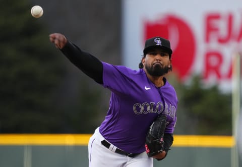 Apr 9, 2022; Denver, Colorado, USA; Colorado Rockies starting pitcher German Marquez (48) delivers a pitch in the first inning against the Los Angeles Dodgers at Coors Field. Mandatory Credit: Ron Chenoy-USA TODAY Sports