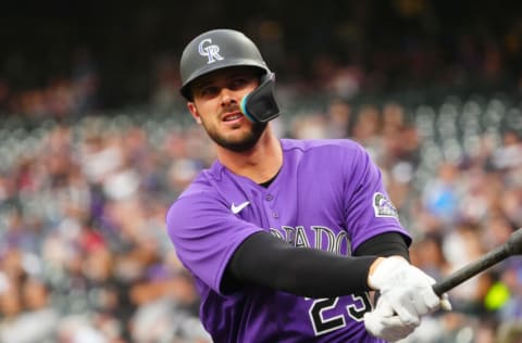 Apr 19, 2022; Denver, Colorado, USA; Colorado Rockies left fielder Kris Bryant (23) on deck in the first inning against the Philadelphia Phillies at Coors Field. Mandatory Credit: Ron Chenoy-USA TODAY Sports