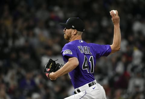 Apr 30, 2022; Denver, Colorado, USA; Colorado Rockies starting pitcher Chad Kuhl (41) delivers a pitch during the eighth inning against the Cincinnati Reds at Coors Field. Mandatory Credit: John Leyba-USA TODAY Sports