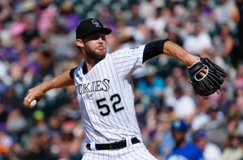 May 15, 2022; Denver, Colorado, USA; Colorado Rockies relief pitcher Daniel Bard (52) delivers a pitch in the ninth inning against the Kansas City Royals at Coors Field. Mandatory Credit: Ron Chenoy-USA TODAY Sports