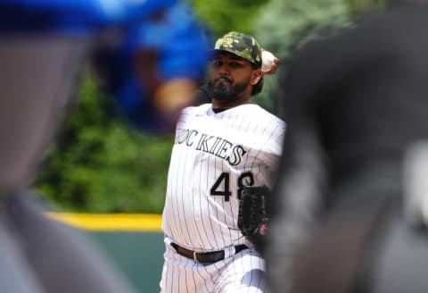 May 21, 2022; Denver, Colorado, USA; Colorado Rockies starting pitcher German Marquez (48) delivers a pitch in the first inning against the New York Mets at Coors Field. Mandatory Credit: Ron Chenoy-USA TODAY Sports