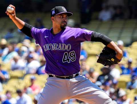 Aug 29, 2021; Los Angeles, California, USA; Colorado Rockies starting pitcher Antonio Senzatela (49) throws a pitch in the first inning against the Los Angeles Dodgers at Dodger Stadium. Mandatory Credit: Robert Hanashiro-USA TODAY Sports