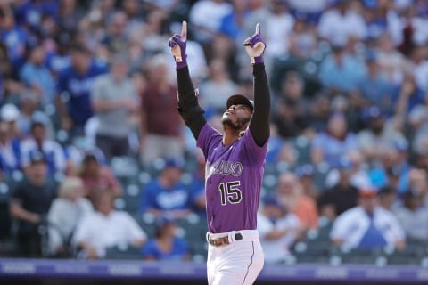 Sep 23, 2021; Denver, Colorado, USA; Colorado Rockies left fielder Raimel Tapia (15) celebrates a two run home run in the sixth inning against the Los Angeles Dodgers at Coors Field. Mandatory Credit: Isaiah J. Downing-USA TODAY Sports