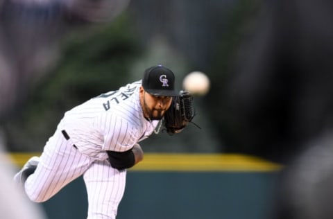 Apr 11, 2017; Denver, CO, USA; Colorado Rockies starting pitcher Antonio Senzatela (49) delivers a pitch in the first inning against the San Diego Padres at Coors Field. Mandatory Credit: Ron Chenoy-USA TODAY Sports