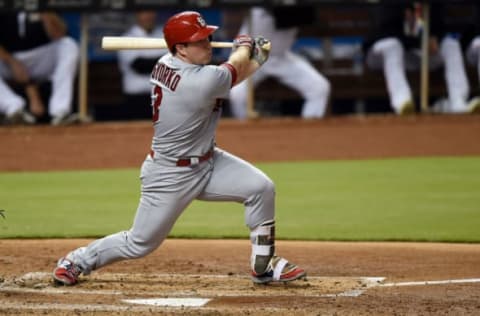 May 10, 2017; Miami, FL, USA; St. Louis Cardinals third baseman Jedd Gyorko (3) connects for a two run RBI single during the third inning against the Miami Marlins at Marlins Park. Mandatory Credit: Steve Mitchell-USA TODAY Sports