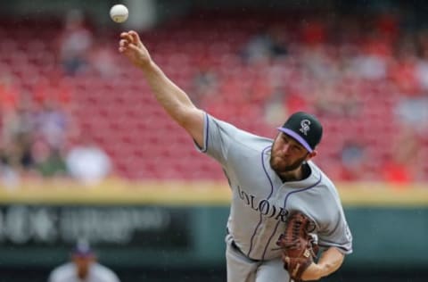 May 21, 2017; Cincinnati, OH, USA; Colorado Rockies relief pitcher Greg Holland (56) throws against the Cincinnati Reds in the ninth inning at Great American Ball Park. Mandatory Credit: Aaron Doster-USA TODAY Sports