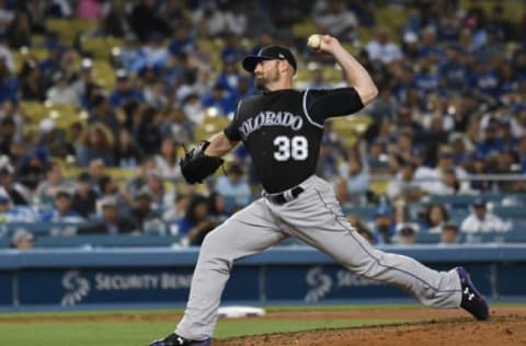 Jun 24, 2017; Los Angeles, CA, USA; Colorado Rockies relief pitcher Mike Dunn (38) pitches against the Los Angeles Dodgers in the eighth inning at Dodger Stadium. Mandatory Credit: Richard Mackson-USA TODAY Sports