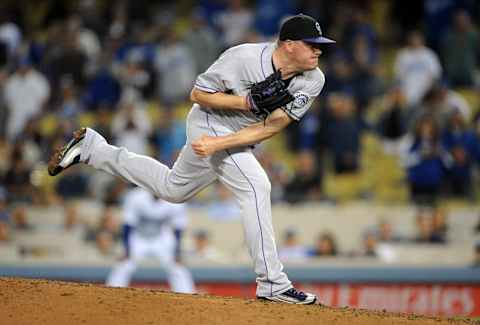 June 8, 2016; Los Angeles, CA, USA; Colorado Rockies relief pitcher Jake McGee (51) throws in the ninth inning against Los Angeles Dodgers at Dodger Stadium. Mandatory Credit: Gary A. Vasquez-USA TODAY Sports