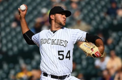 Aug 17, 2016; Denver, CO, USA; Colorado Rockies relief pitcher 