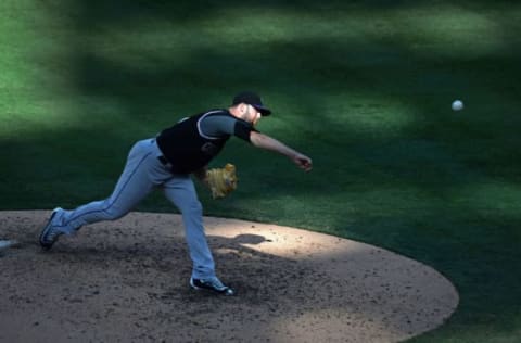 Sep 11, 2016; San Diego, CA, USA; Colorado Rockies relief pitcher Jordan Lyles (24) pitches during the eighth inning against the San Diego Padres at Petco Park. Mandatory Credit: Jake Roth-USA TODAY Sports