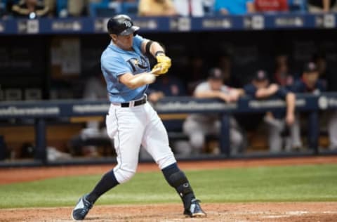 Sep 25, 2016; St. Petersburg, FL, USA; Tampa Bay Rays third baseman Evan Longoria (3) gets a hit in the tenth inning against the Boston Red Sox at Tropicana Field. Mandatory Credit: Jeff Griffith-USA TODAY Sports