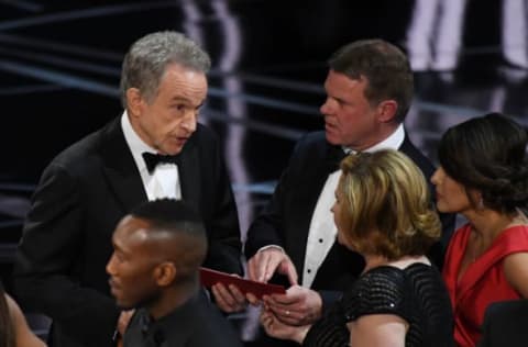 Feb 26, 2017; Hollywood, CA, USA; Warren Beatty speaks to Brian Cullinan, a CPA from PriceWaterhouseCoopers for the Oscars during the 89th Academy Awards at Dolby Theatre. Mandatory Credit: Robert Deutsch-USA TODAY NETWORK