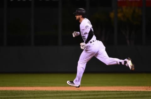 Aug 19, 2016; Denver, CO, USA; Colorado Rockies left fielder David Dahl (26) rounds the bases after his solo home run in the first inning against the Chicago Cubs at Coors Field. Mandatory Credit: Ron Chenoy-USA TODAY Sports