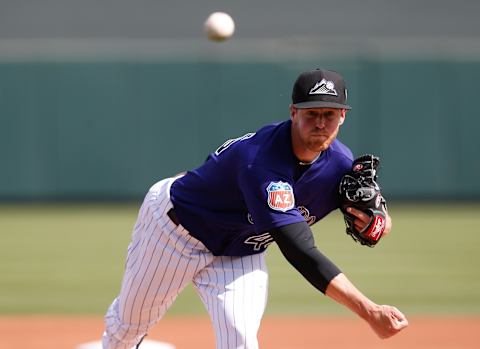 Mar 2, 2016; Salt River Pima-Maricopa, AZ, USA; Colorado Rockies relief pitcher Scott Oberg (45) throws in the first inning during a spring training game against the Arizona Diamondbacks at Salt River Fields at Talking Stick. Mandatory Credit: Rick Scuteri-USA TODAY Sports