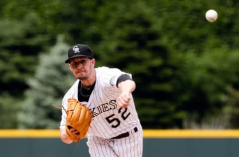 May 29, 2016; Denver, CO, USA; Colorado Rockies relief pitcher Chris Rusin (52) delivers a pitch in the first inning against the San Francisco Giants at Coors Field. Mandatory Credit: Isaiah J. Downing-USA TODAY Sports