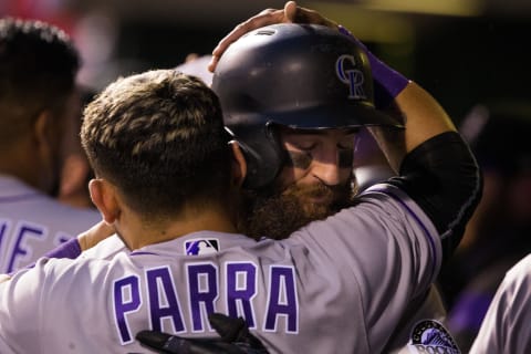 May 23, 2017; Philadelphia, PA, USA; Colorado Rockies center fielder Charlie Blackmon (19) hugs left fielder Gerardo Parra (8) after hitting a two RBI home run during the fourth inning against the Philadelphia Phillies at Citizens Bank Park. Mandatory Credit: Bill Streicher-USA TODAY Sports