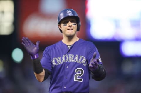 Jul 20, 2015; Denver, CO, USA; Colorado Rockies shortstop Troy Tulowitzki (2) reacts during the fourth inning against the Texas Rangers at Coors Field. Mandatory Credit: Chris Humphreys-USA TODAY Sports