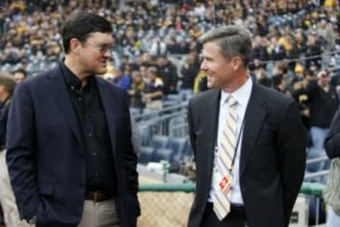 Oct 7, 2013; Pittsburgh, PA, USA; Pittsburgh Pirates owner Bob Nutting (left) talks with Pirates president Frank Coonelly (right) before hosting the St. Louis Cardinals in game four of the National League divisional series at PNC Park. The St. Louis Cardinals won 2-1. Mandatory Credit: Charles LeClaire-USA TODAY Sports