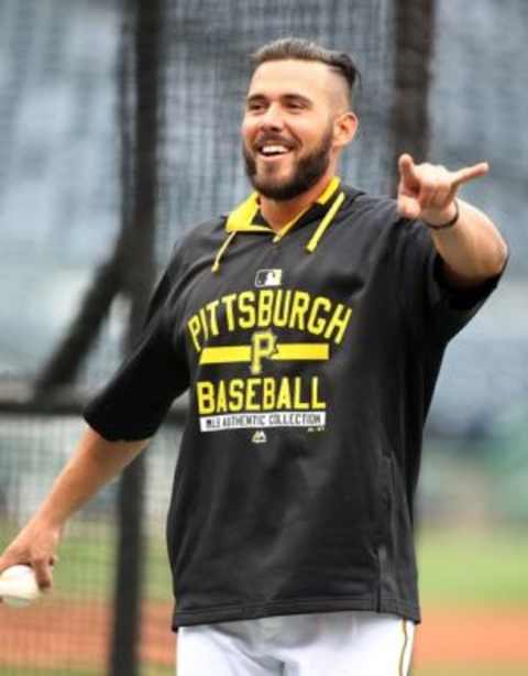 Apr 14, 2015; Pittsburgh, PA, USA; Pittsburgh Pirates catcher Tony Sanchez (26) reacts on the field before playing the Detroit Tigers at PNC Park. Mandatory Credit: Charles LeClaire-USA TODAY Sports