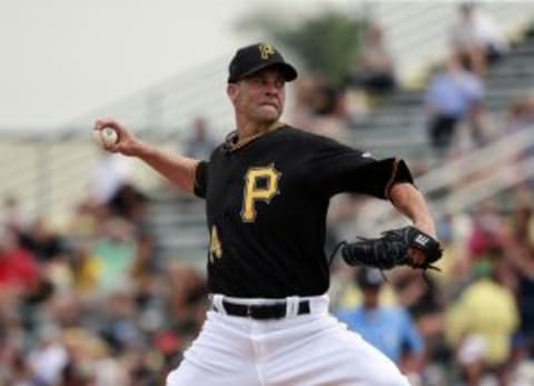 Mar 3, 2016; Bradenton, FL, USA; Pittsburgh Pirates starting pitcher Ryan Vogelsong (14) throws a pitch during the third inning against the Toronto Blue Jays at McKechnie Field. Mandatory Credit: Kim Klement-USA TODAY Sports