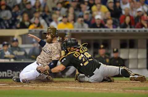 May 31, 2015; San Diego, CA, USA; San Diego Padres catcher Derek Norris (3) is tagged out by Pittsburgh Pirates catcher Francisco Cervelli (29) on a play at home during the eighth inning at Petco Park. Mandatory Credit: Jake Roth-USA TODAY Sports