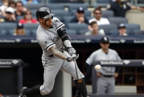 May 14, 2016; Bronx, NY, USA; Chicago White Sox second baseman Brett Lawrie (15) hits a double in the fourth inning against the New York Yankees at Yankee Stadium. Mandatory Credit: Noah K. Murray-USA TODAY Sports