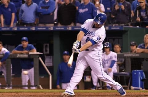 May 3, 2016; Kansas City, MO, USA; Kansas City Royals third baseman Mike Moustakas (8) connects for a two run single in the ninth inning to tie the game against the Washington Nationals at Kauffman Stadium. The Royals won 7-6. Mandatory Credit: Denny Medley-USA TODAY Sports