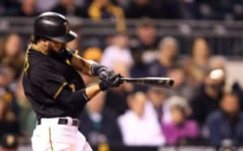 May 3, 2016; Pittsburgh, PA, USA; Pittsburgh Pirates second baseman Sean Rodriguez (3) singles against the Chicago Cubs during the eighth inning at PNC Park. The Cubs won 7-1. Mandatory Credit: Charles LeClaire-USA TODAY Sports