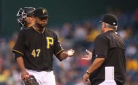 Jun 3, 2016; Pittsburgh, PA, USA; Pittsburgh Pirates starting pitcher Francisco Liriano (47) hands the ball to manager Clint Hurdle (right) after being removed from the game against the Los Angeles Angels during the fourth inning at PNC Park. Mandatory Credit: Charles LeClaire-USA TODAY Sports