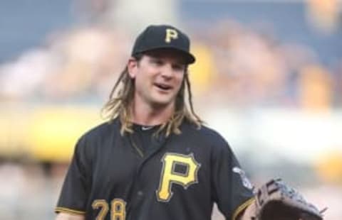 Jun 3, 2016; Pittsburgh, PA, USA; Pittsburgh Pirates first baseman John Jaso (28) reacts in the field against the Los Angeles Angels during the first inning at PNC Park. Mandatory Credit: Charles LeClaire-USA TODAY Sports