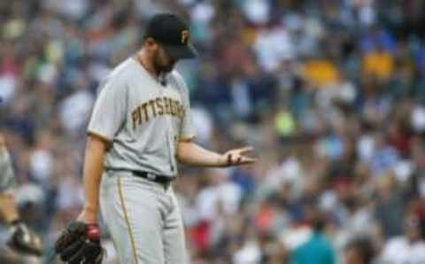 Jun 28, 2016; Seattle, WA, USA; Pittsburgh Pirates starting pitcher Jonathon Niese (18) walks back to the dugout after the final out of the fourth inning against the Seattle Mariners at Safeco Field. Mandatory Credit: Joe Nicholson-USA TODAY Sports