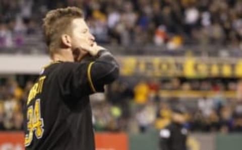 Oct 3, 2015; Pittsburgh, PA, USA; Pittsburgh Pirates starting pitcher A.J. Burnett (34) blows a kiss to the crowd as he takes a curtain call after being removed from the game against the Cincinnati Reds during the seventh inning at PNC Park. Burnett announced he will retire at the conclusion of the season. This was the final regular season start of his career. The Reds won 3-1. Mandatory Credit: Charles LeClaire-USA TODAY Sports