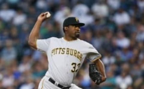 Jun 28, 2016; Seattle, WA, USA; Pittsburgh Pirates relief pitcher Arquimedes Caminero (37) throws against the Seattle Mariners during the sixth inning at Safeco Field. Seattle defeated Pittsburgh, 5-2. Mandatory Credit: Joe Nicholson-USA TODAY Sports